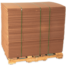 Stacked cardboard sheets on wooden pallet