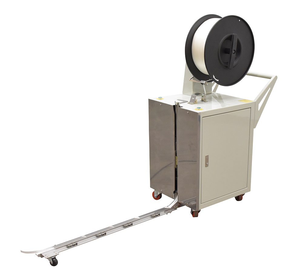 Strapping machine with wheels and spool