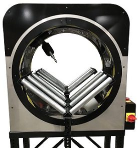 A circular device with rollers and a probe inside, possibly for testing.