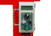 Industrial control panel on red background