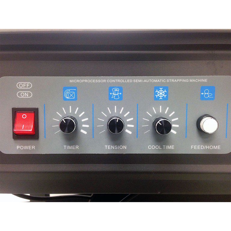 Strapping machine control panel with knobs