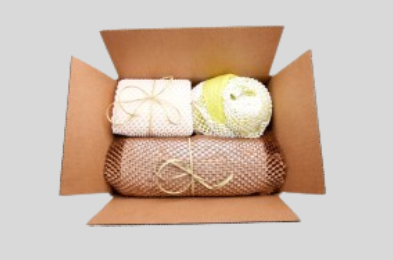 open box containing mesh wrapped cushioning items