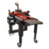 Box taping machine on roller conveyor