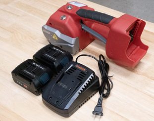 Red cordless banding tool with two batteries