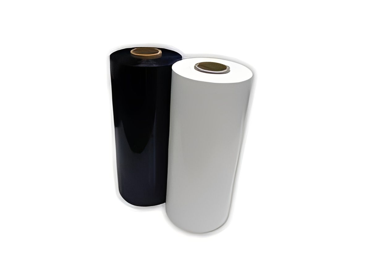 Two large rolls, one black and one white