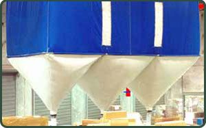 Three white conical industrial hoppers